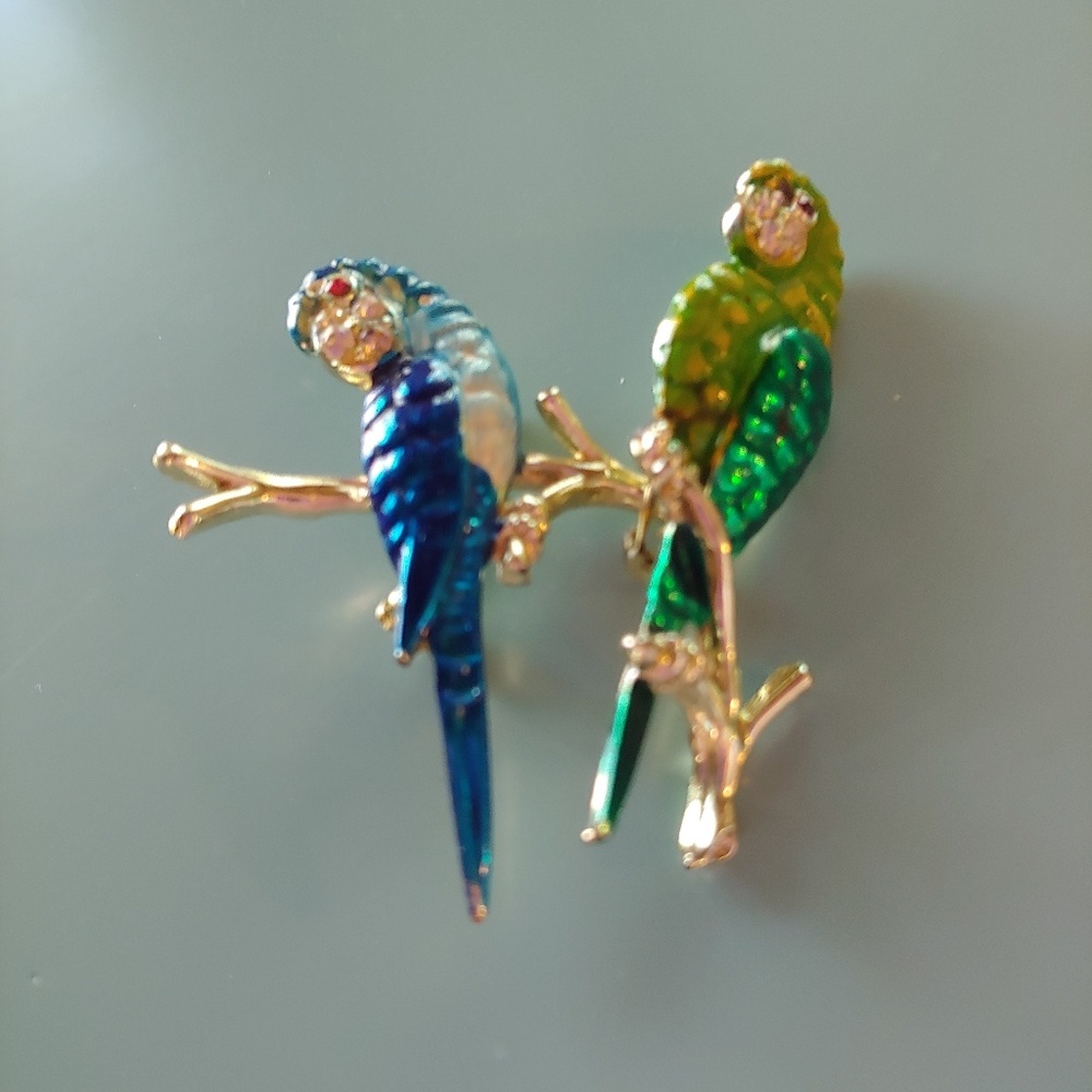 Vintage parrot brooches set